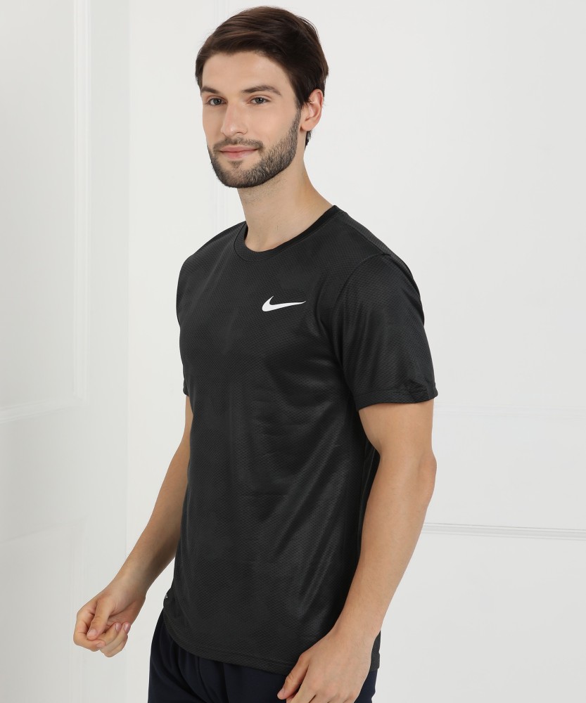 NIKE Solid Men Round Neck Black T-Shirt - Buy NIKE Solid Men Round Neck  Black T-Shirt Online at Best Prices in India