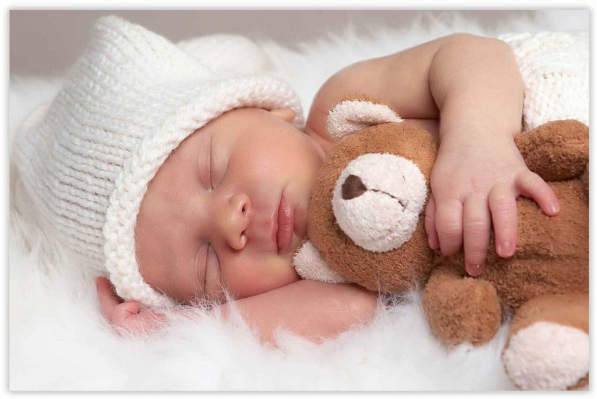 Baby sleeping discount with teddy bear