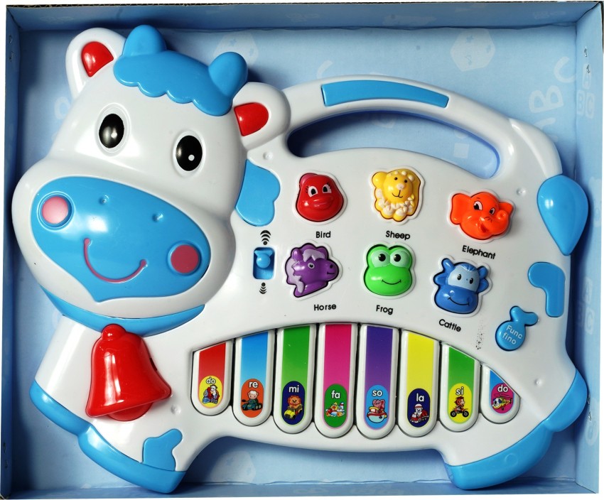 Cow piano toy on sale