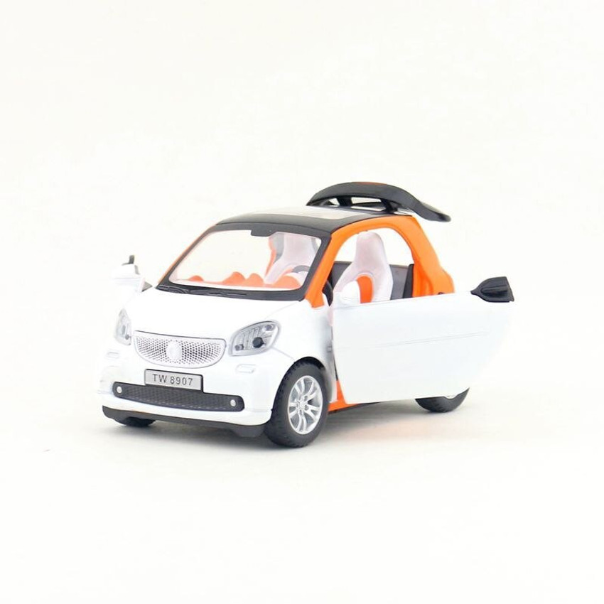 EMOB Orange 1 24 Die Cast Metal Smart Fortwo Pull Back Car Toy with Openable Doors Light and Sound Effects Orange 1 24 Die Cast Metal Smart Fortwo Pull Back Car Toy with