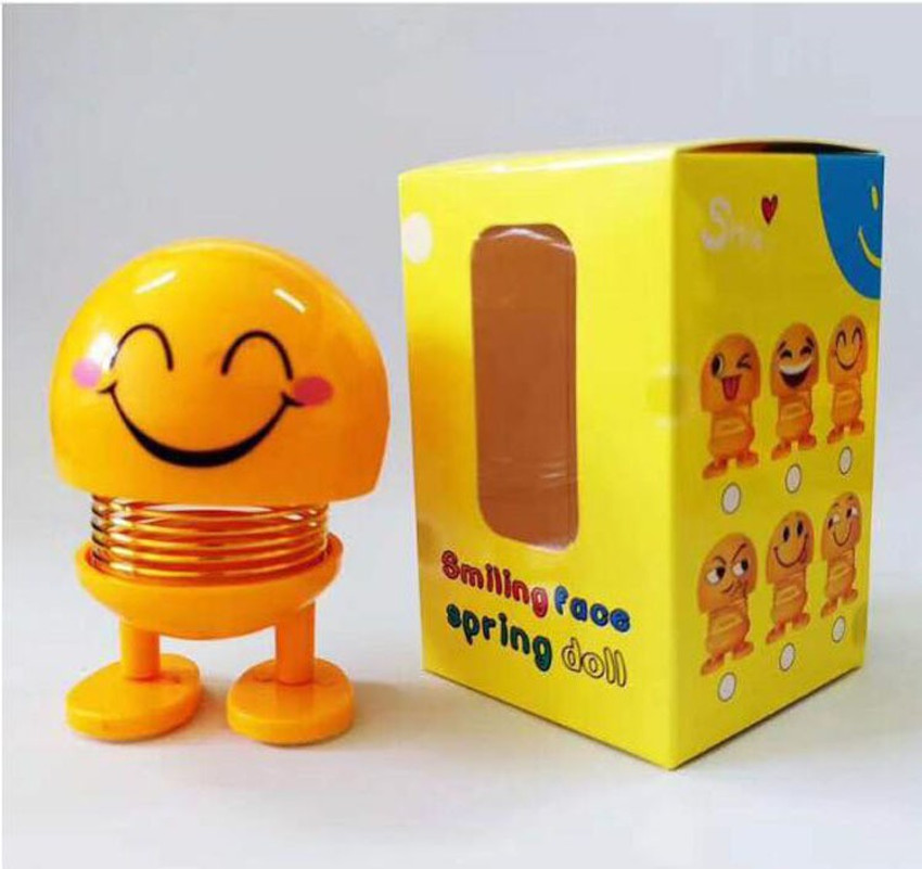 Smiling face spring doll discount