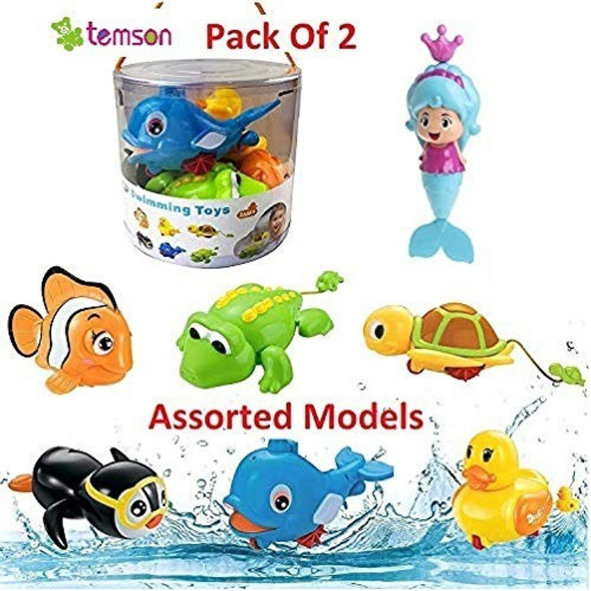 Wind up swimming toy top