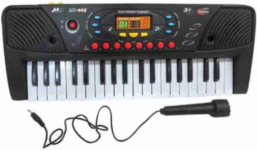 Toy piano with mike hotsell