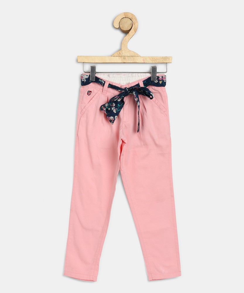 Premium Photo  Casual pants of pink color pink trousers on wooden  background highquality merchandise in stock girls