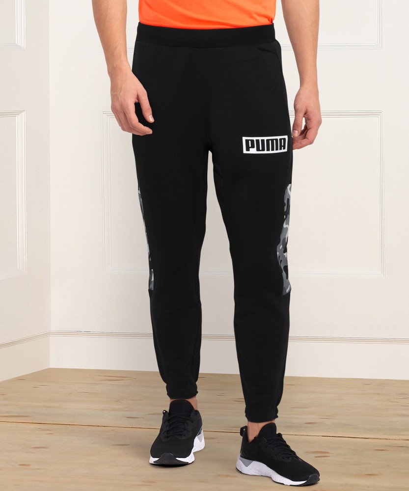 PUMA Solid Men Black Track Pants - Buy PUMA Solid Men Black Track Pants  Online at Best Prices in India