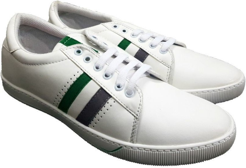 White shoes clearance with green stripes