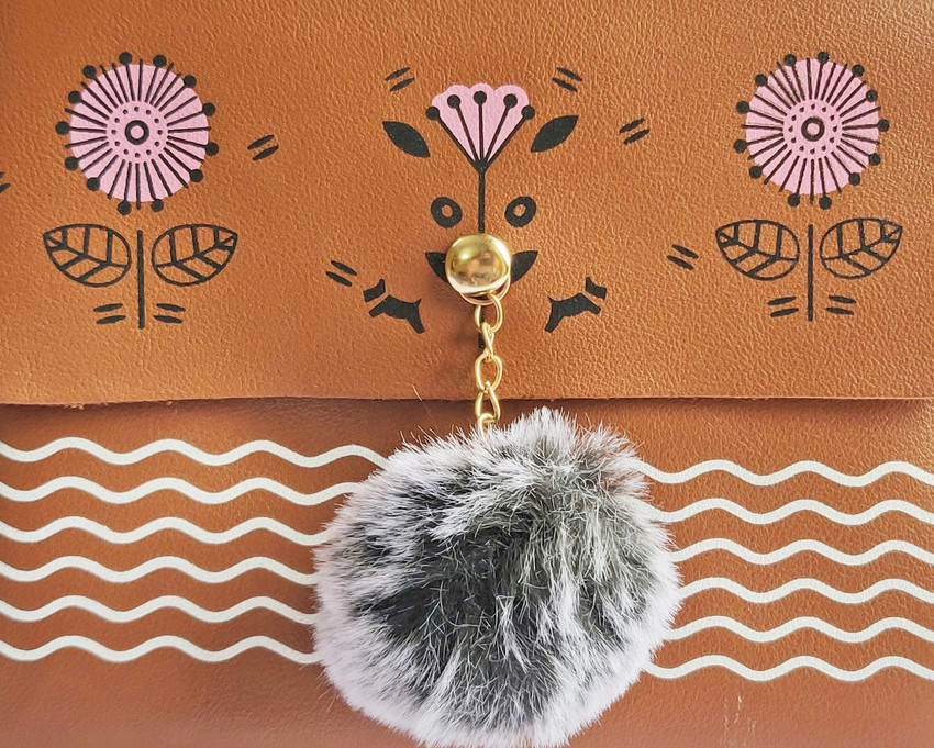 Pom pom store sling bag