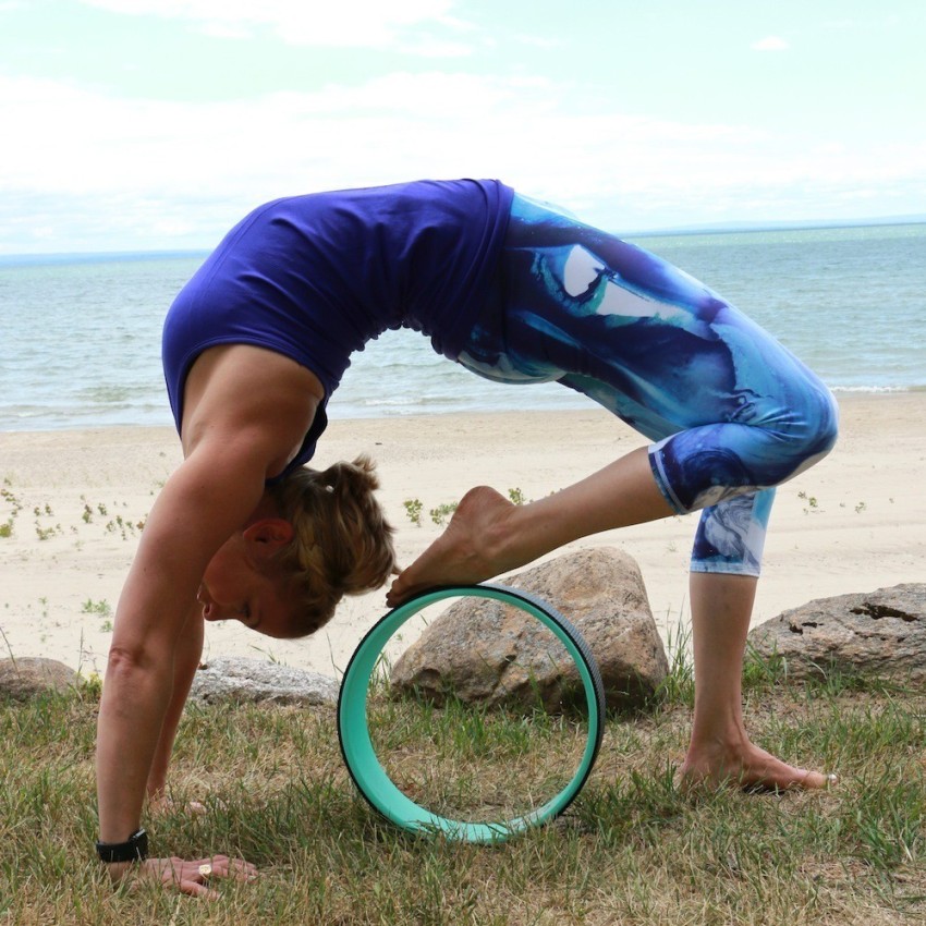 Back Decompression with a Yoga Wheel - Yoloha Life Blog