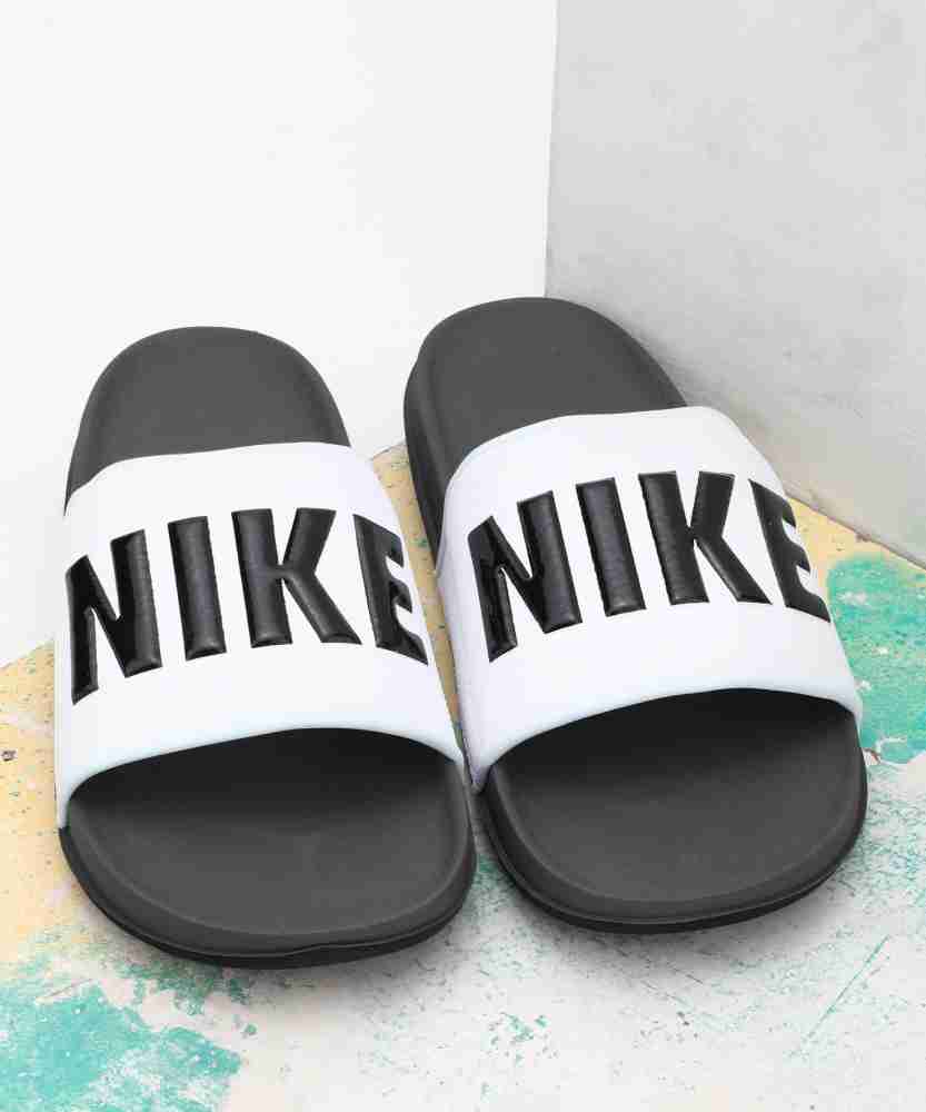 Black and outlet white benassi slides