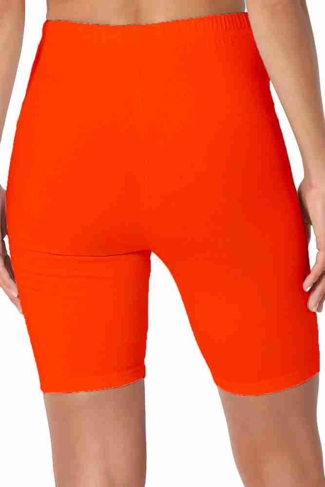 Orange cycling top shorts women's