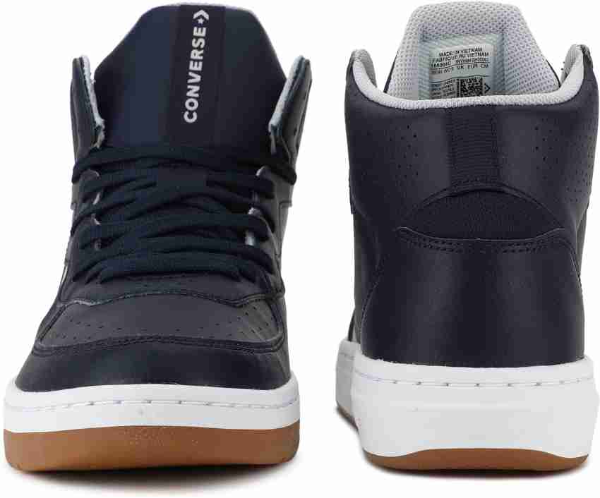 Unisex converse rival leather hotsell mid top