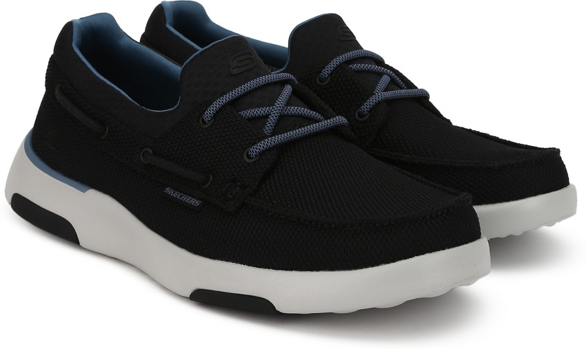 Black skechers boat top shoes