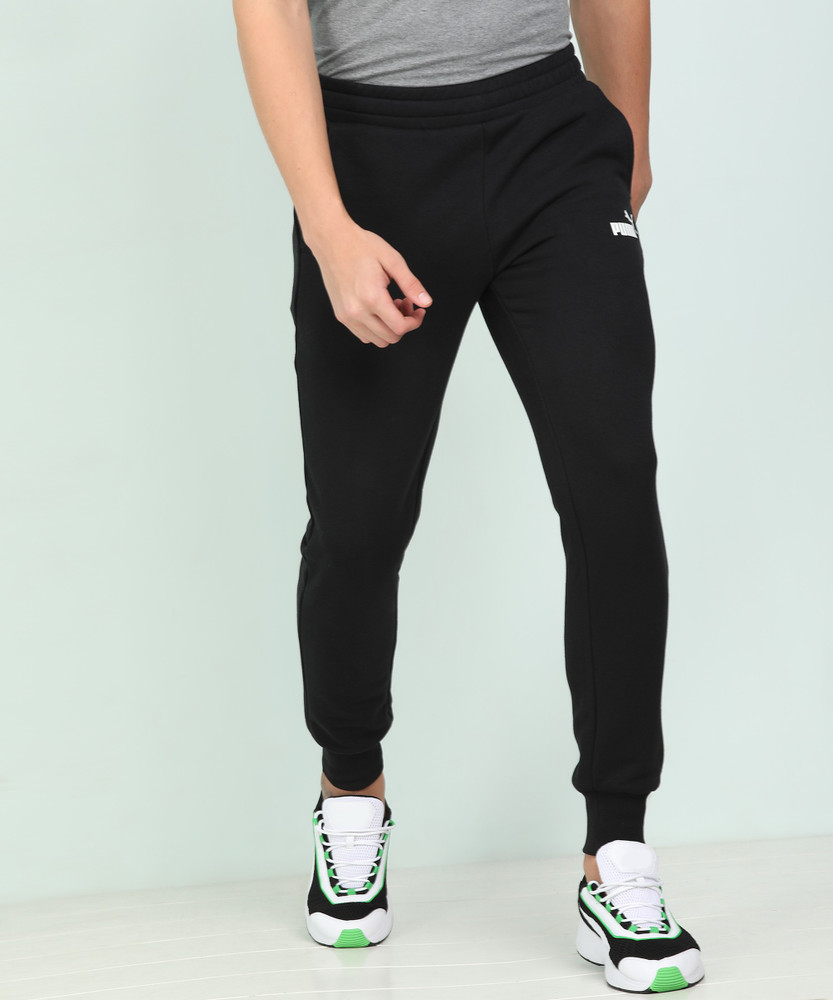 PUMA ESS Logo Pants FL cl Solid Men Black Track Pants Buy PUMA