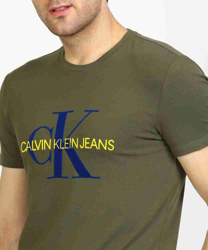 Calvin Klein Jeans Solid Men Round Neck Green T-Shirt - Buy Calvin Klein  Jeans Solid Men Round Neck Green T-Shirt Online at Best Prices in India