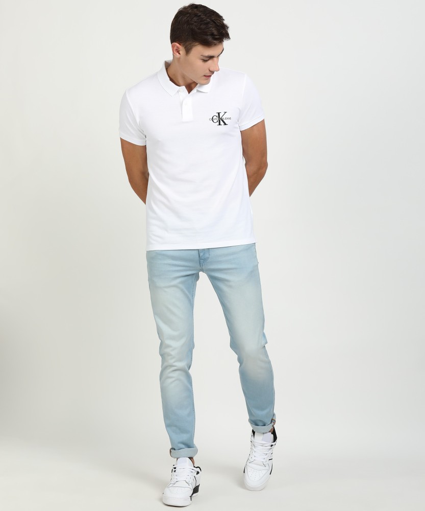 Calvin Klein Jeans Solid Men Polo Neck White T-Shirt - Buy Calvin Klein  Jeans Solid Men Polo Neck White T-Shirt Online at Best Prices in India