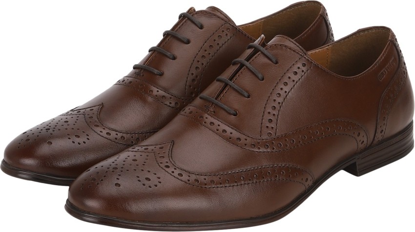 Red tape clearance brogues in oxblood