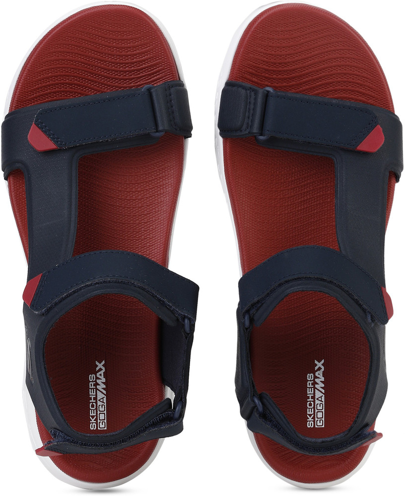 red sketcher sandals