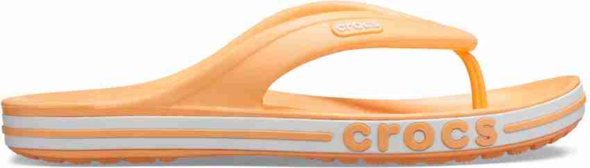 Orange croc top flip flops