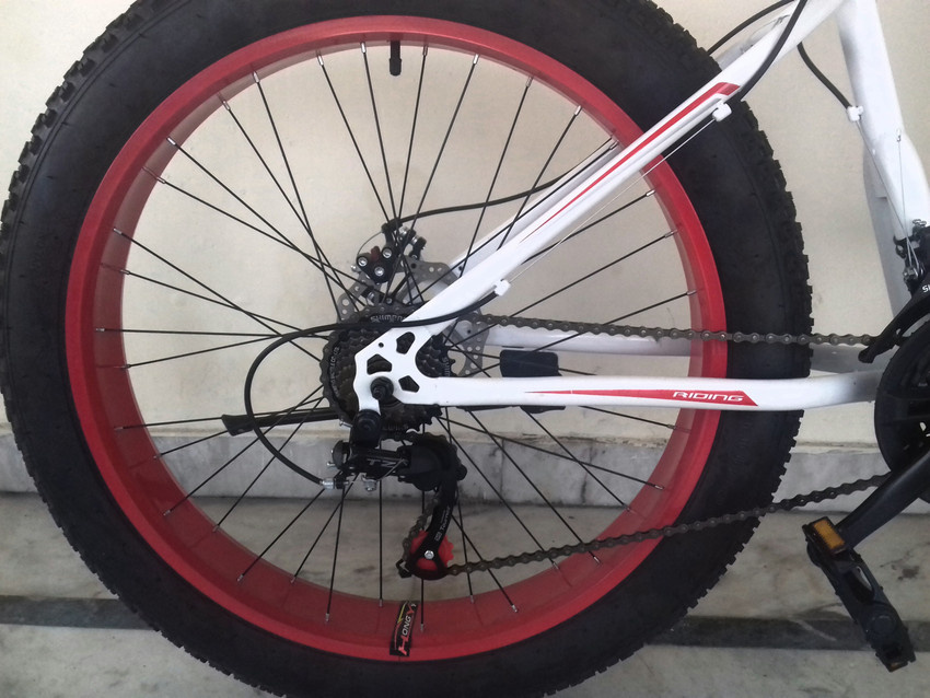 maatrixx riding fat tyre mountain bike dual disc brakes and front