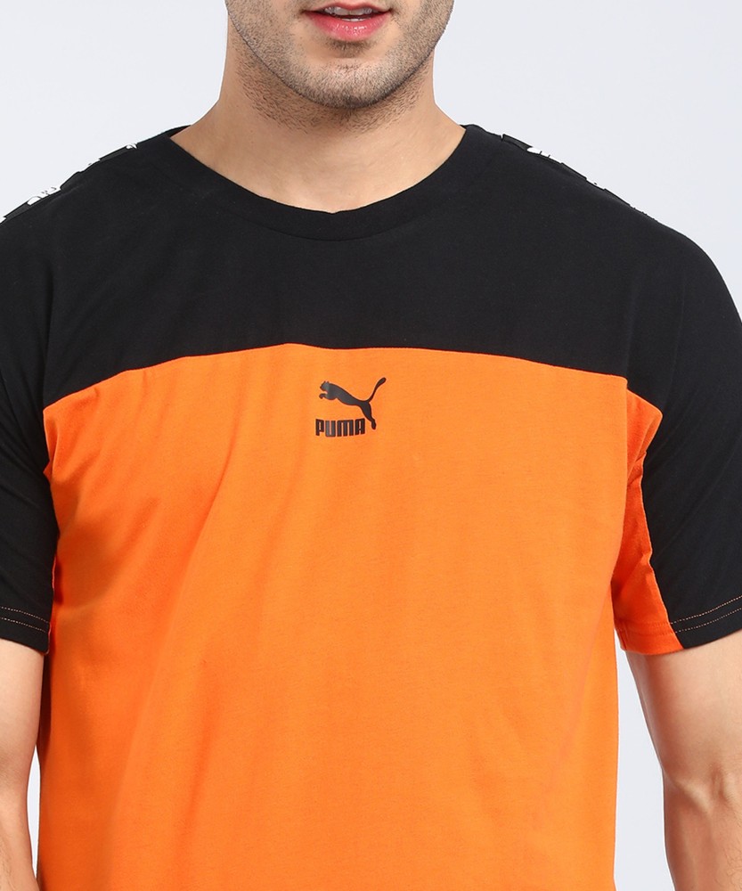 Prices Round Round T-Shirt - PUMA India at in Colorblock Online Men Colorblock Black, Best Orange Orange Buy Men Black, Neck PUMA T-Shirt Neck