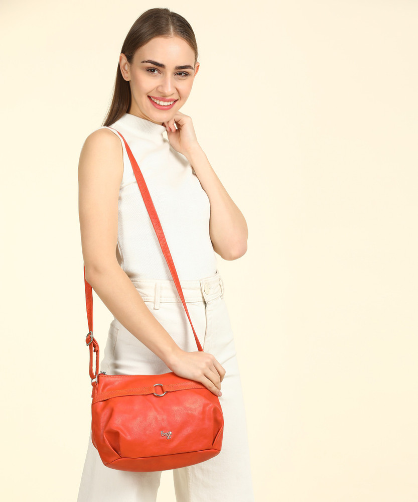 Baggit orange online sling bag
