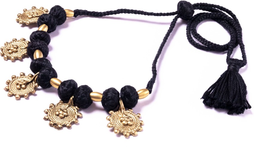 Black thread necklace with Lakshmi pendant photo  Black beaded jewelry,  Gold jewellery design necklaces, Bridal jewelry necklace