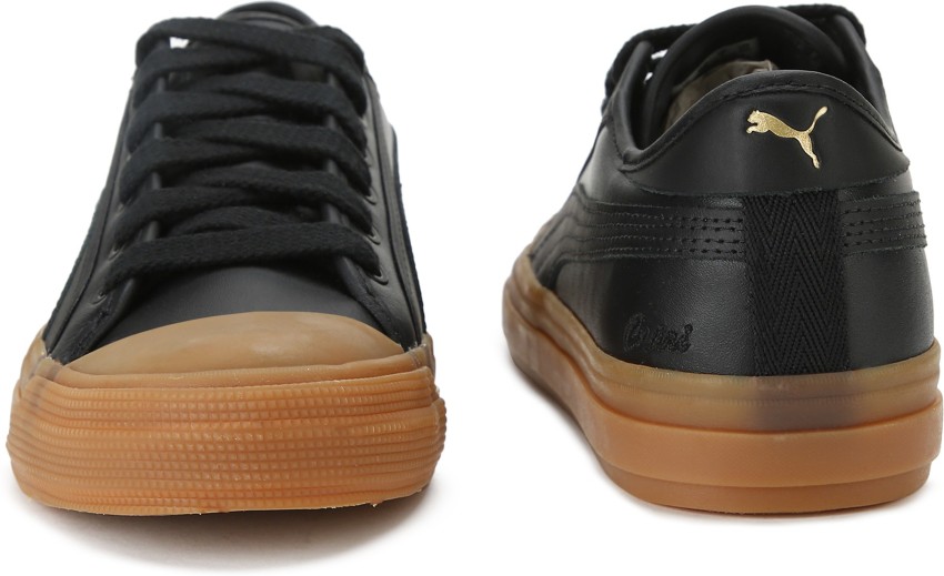 Puma capri sales leather sneakers