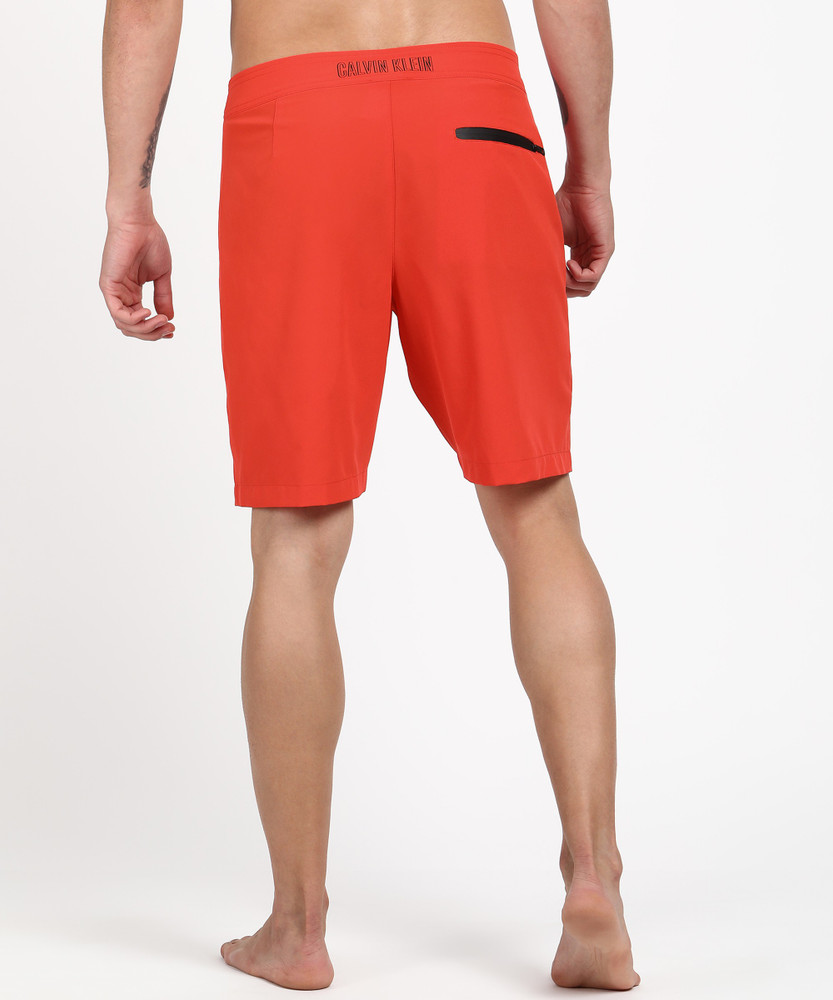 Orange calvin klein shorts outlet