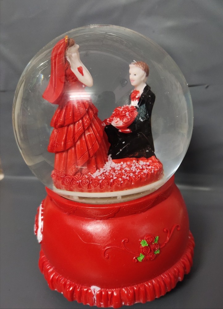 Anant Gift Gallery COUPLE SHOWPIECE WITH REVOLVING & MUSICAL