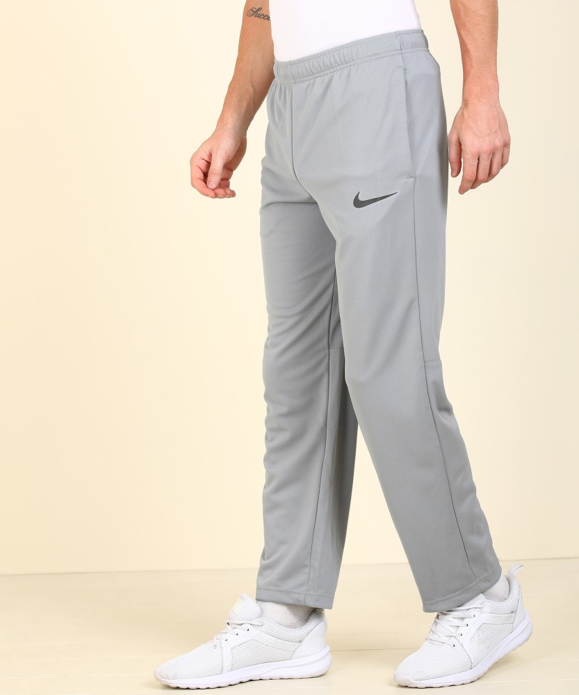 NIKE Solid Men Grey Track Pants Buy NIKE Solid Men Grey Track