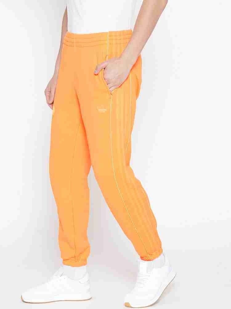 White and hotsell orange track pants