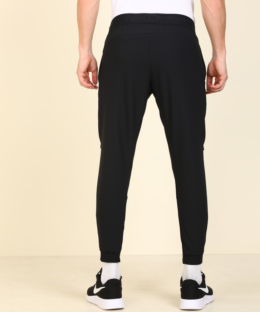 NIKE Self Design Men Black Track Pants Buy NIKE Self Design Men
