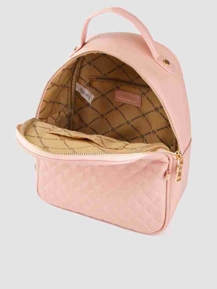 Pink top quilted backpack