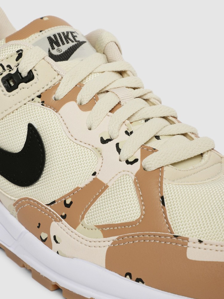 Nike cream colour shoes hotsell