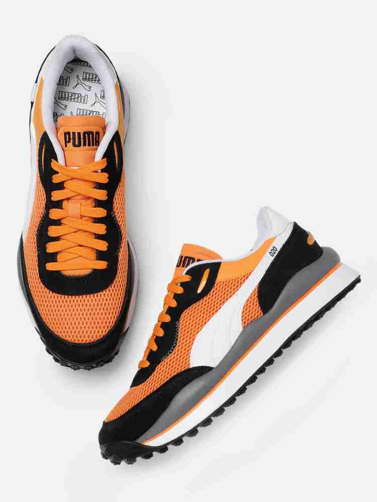 Puma black orange trainers best sale