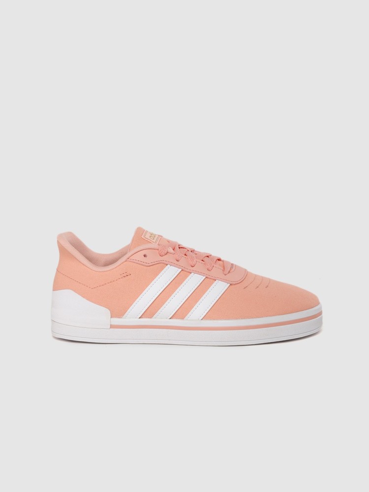 Peach color adidas store shoes