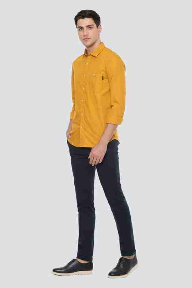 Yellow shirt and hot sale black jeans