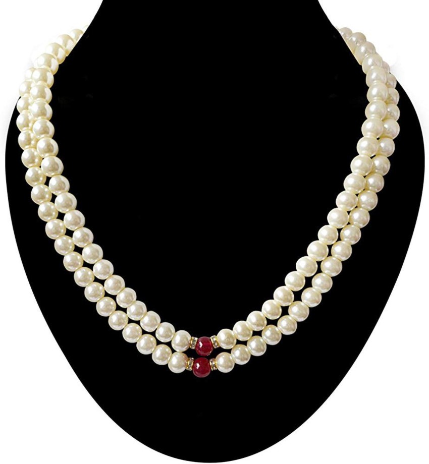 Red and store white pearl necklace