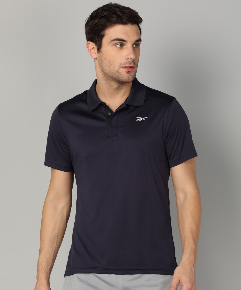 REEBOK Solid Men Polo Neck Purple T Shirt Buy REEBOK Solid Men