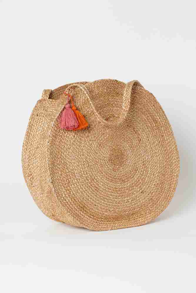 Round jute clearance sling bag