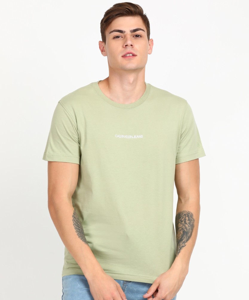 Calvin Klein Jeans Solid Men Round Neck Green T-Shirt - Buy Calvin Klein  Jeans Solid Men Round Neck Green T-Shirt Online at Best Prices in India