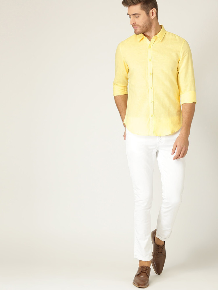 Yellow shirt with white pants on sale