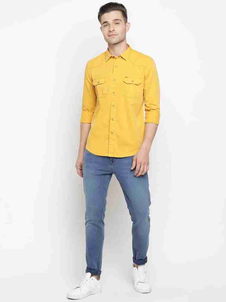 Blue jeans shop yellow shirt