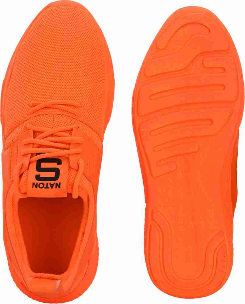 Light orange sales nike shoes