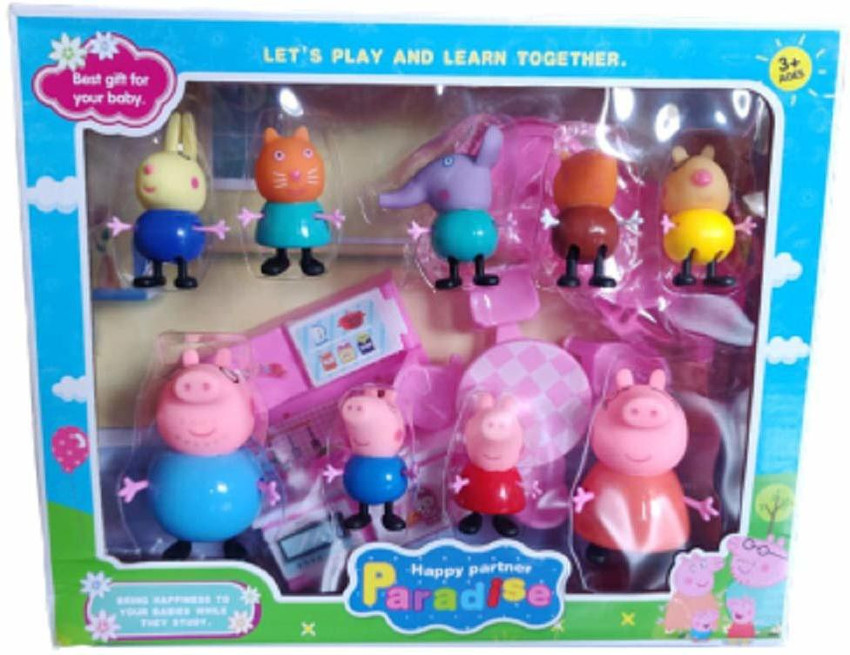 A plastic Peppa Pig toy play house standing on a table Stock Photo