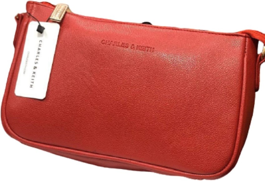 Charles and keith sales red sling bag