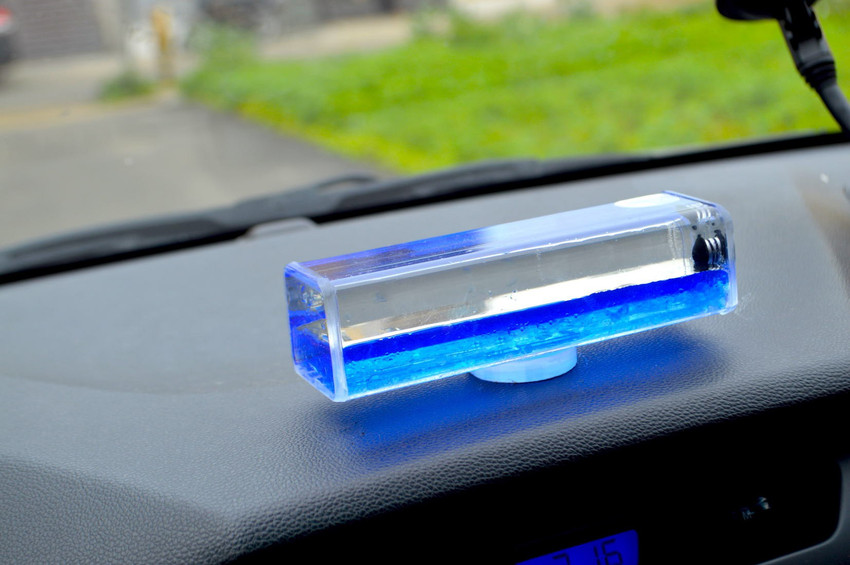 Alzoh Car Dashboard Accessory with Wave Motion showpiece