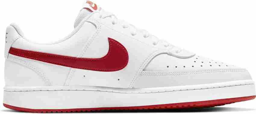 Nike trainers with sales red tick