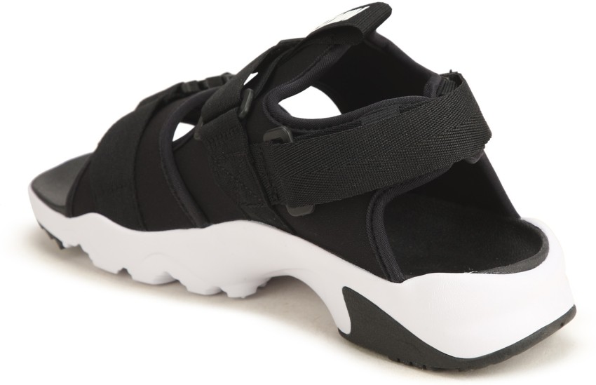 Nike city best sale sandals in black