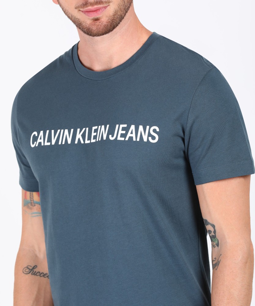 Calvin Klein Jeans Printed Men Round Neck Blue T-Shirt - Buy Calvin Klein  Jeans Printed Men Round Neck Blue T-Shirt Online at Best Prices in India